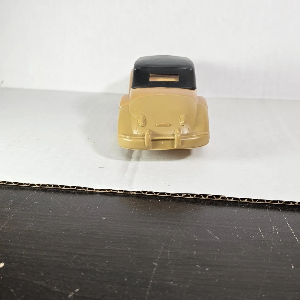 Avon Cord 37 Car Bottle. Tan Tai Winds After Shave Bottle